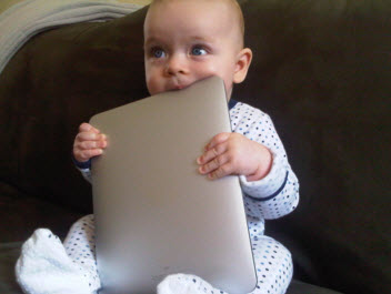 baby with digital tablet